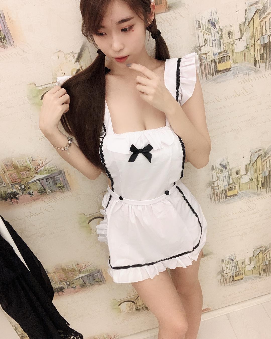 Lai Wei Betty is showing off her petite tight body for you in this sexy maid cosplay