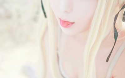 Cute Japanese Baby Doll Girl Blond Hair and Rabbit Doll